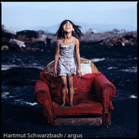 Filipino child in charcoal fields